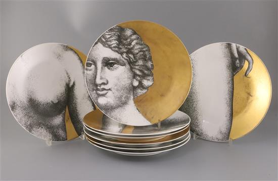 A group of eight Fornasetti plates, Diam.26cm